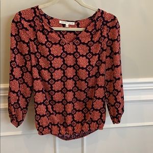 Sophisticated red V-neck top